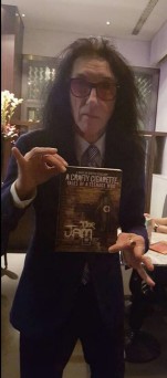 John Cooper-Clark with his copy of A Crafty Cigarette